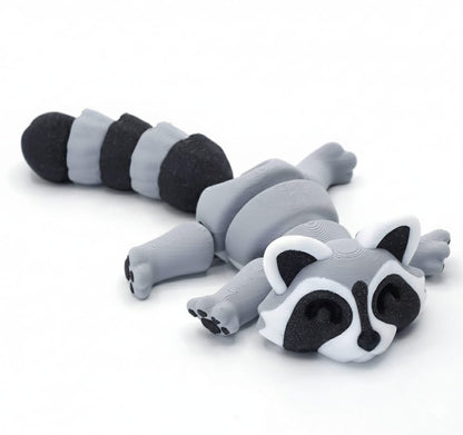 🦝 Mapache articulado en 3D – Figura de la Colección Animalitos de Dientes Mágicos – Ideal para packs de cumpleaños